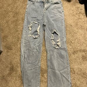 Blue ripped baggy jeans